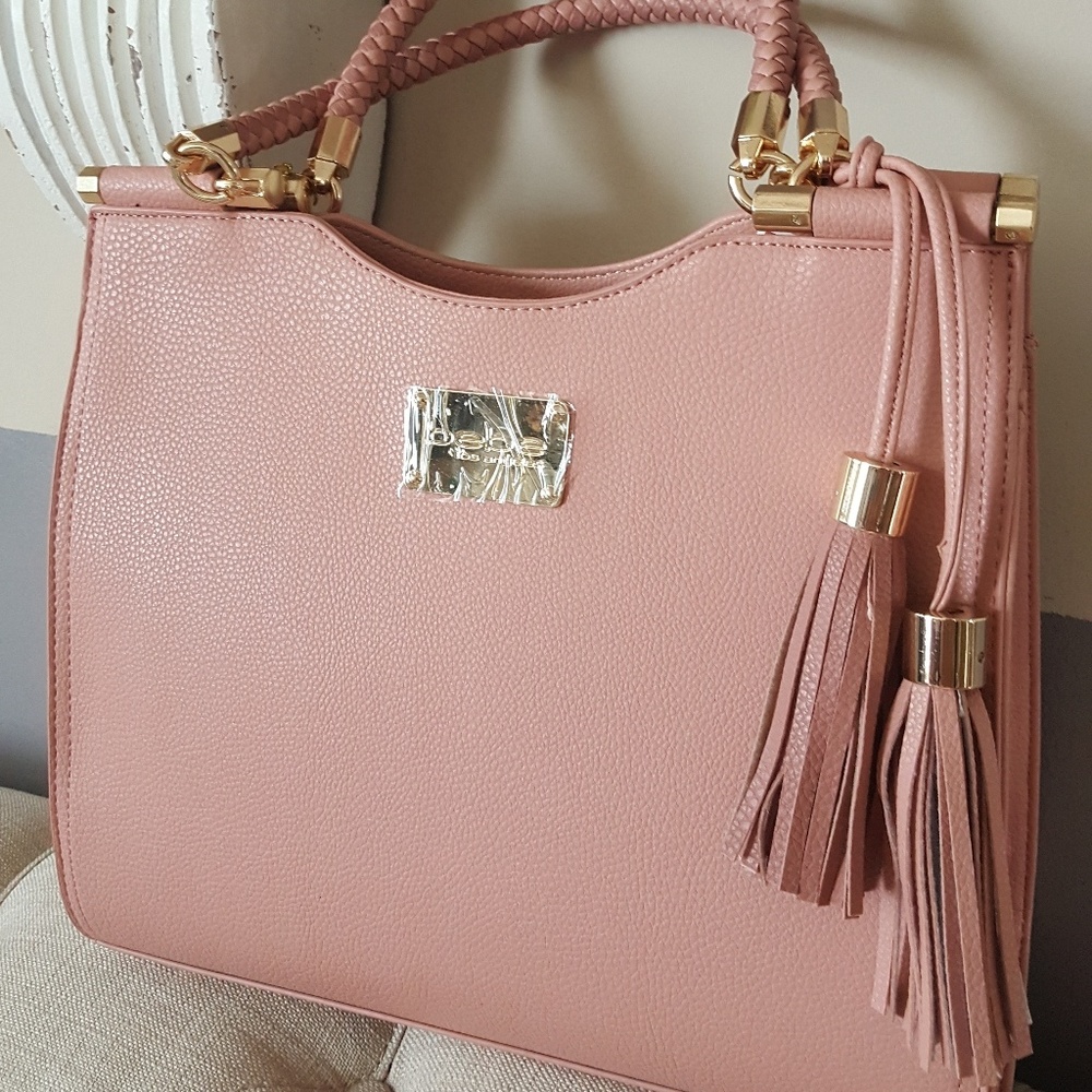 Authentic Bebe purse in blush color.